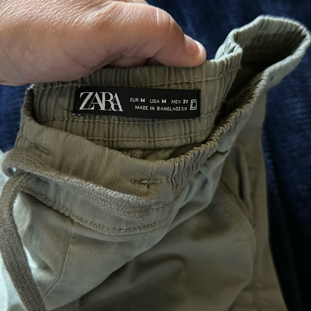 This is a greenish tan Zara brand new pants with 4 pockets and Elastic legs